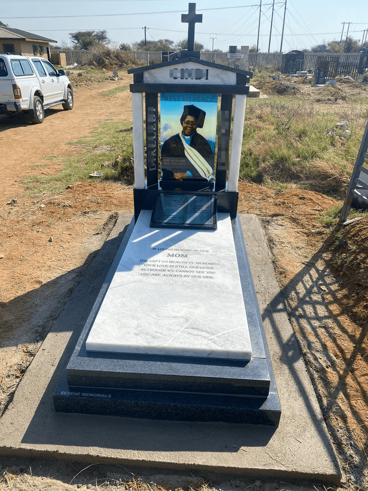 Glass memorial portrait with intricate design